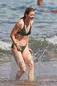 Ellen Pompeo - Wearing a sexy wet bikini on a beach in Maui (June 6, 2012)
