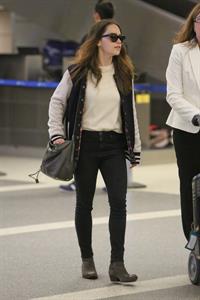 Emilia Clarke LAX airport in Los Angeles, October 15, 2013 