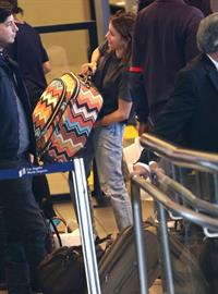 Emma Roberts departing on a flight at LAairport in Los Angeles, California on December 22, 2012 