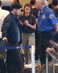 Emma Roberts departing on a flight at LAairport in Los Angeles, California on December 22, 2012 