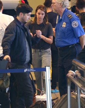 Emma Roberts departing on a flight at LAairport in Los Angeles, California on December 22, 2012 