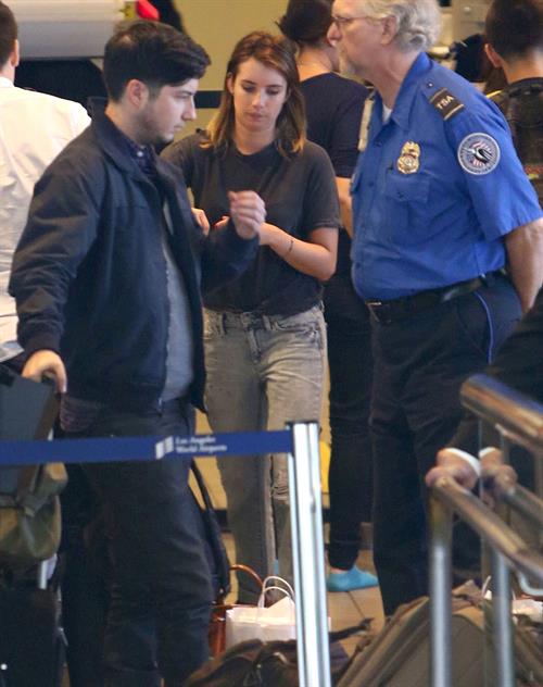 Emma Roberts departing on a flight at LAairport in Los Angeles, California on December 22, 2012 