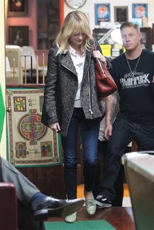 Emma Stone Stopped at Shamrock Tattoo - October 17, 2012 