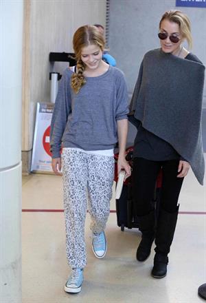 Felicity Huffman Arrives at LAX Airport with daughter in Los Angeles (November 11, 2013) 