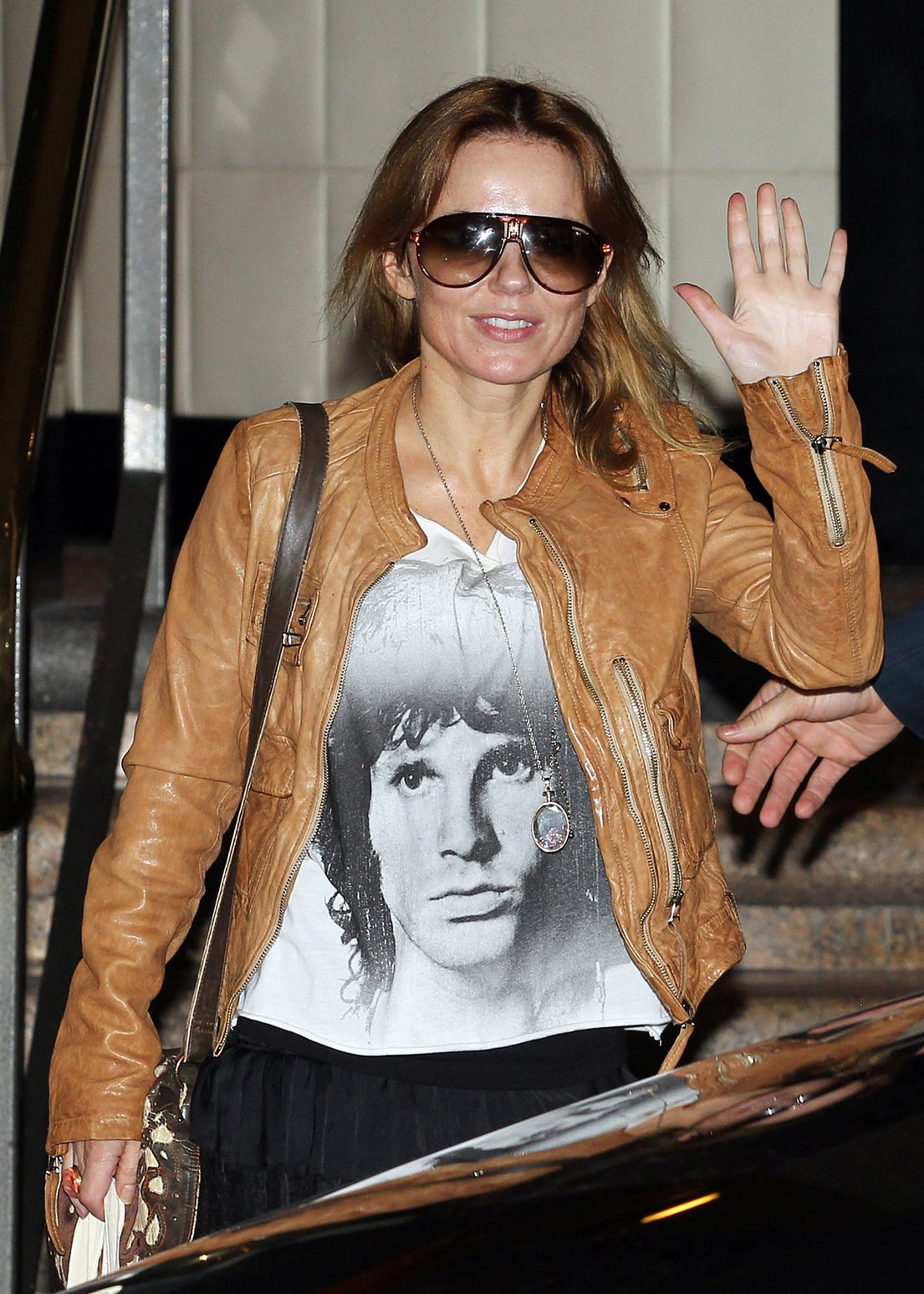 Geri Halliwell leaves The Sheraton On The Park Hotel in Sidney on June 26, 2013