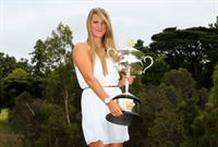 Victoria Azarenka poses with Memorial Cup after winning the 2013 Australian Open January 27, 2013 