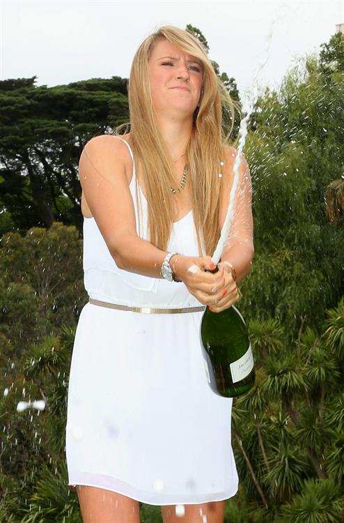 Victoria Azarenka poses with Memorial Cup after winning the 2013 Australian Open January 27, 2013 
