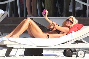 Victoria Silvstedt in a bikini on the beach in St. Barts 1/5/13