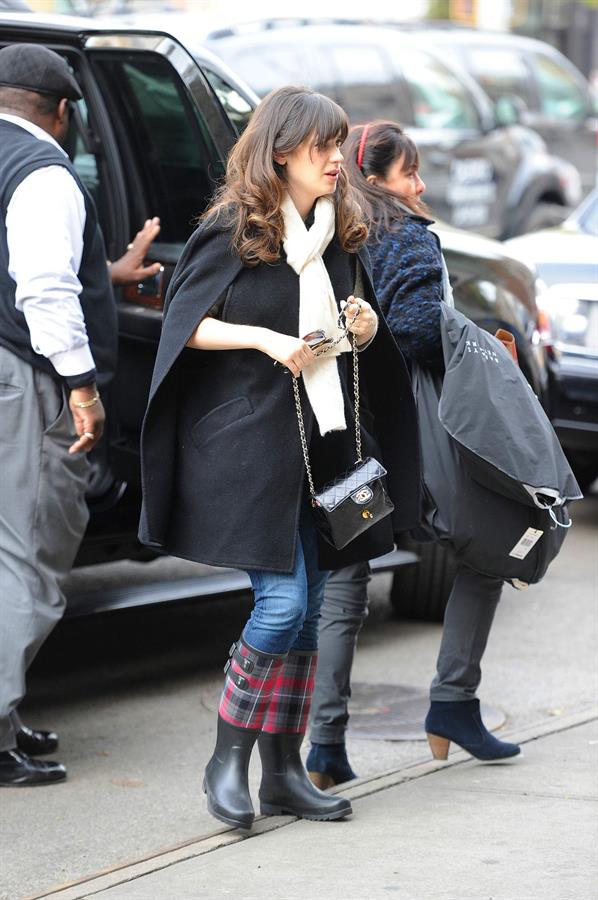Zooey Deschanel seen out in SoHo holding a Chanel purse. November 16, 2012 