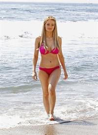 Holly Madison - In a pink bikini at Laguna Beach in California Sept 6, 2012