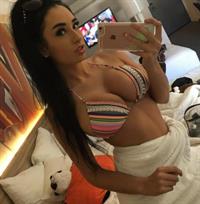 Paris Dylan in a bikini taking a selfie