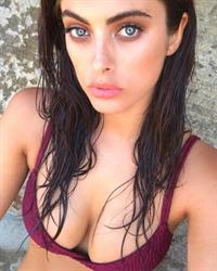 Caroline Austin in a bikini taking a selfie