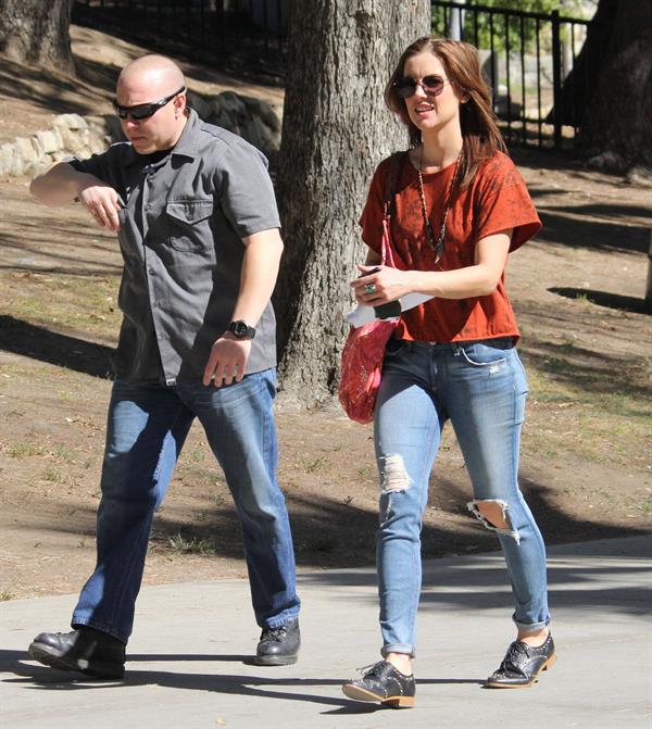 Jessica Stroup takes a break on the set of 90210 in Los Angeles on February 26, 2013