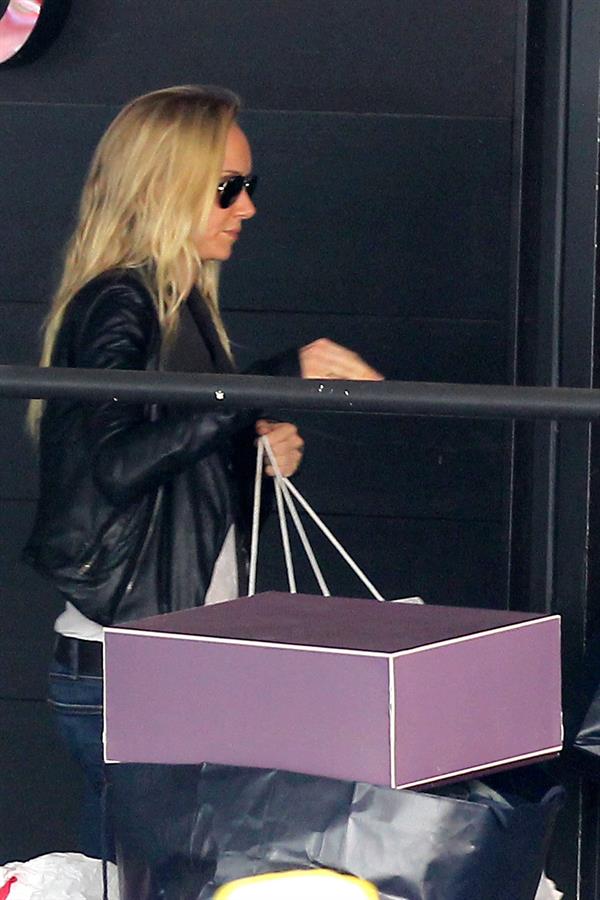 Kimberly Stewart Donating a trunk full of designer clothes at Wasteland in Los Angeles (November 15, 2012) 