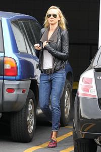 Kimberly Stewart Donating a trunk full of designer clothes at Wasteland in Los Angeles (November 15, 2012) 