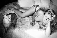 Maria Anohina in a Photoshoot with her cat.  Alisa Verner photographer