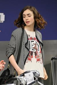 Lily Collins - LAX Airport 8/27/13