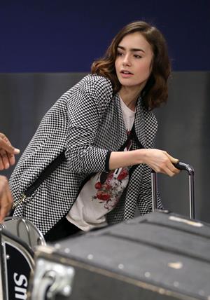 Lily Collins - LAX Airport 8/27/13