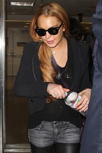 Lindsay Lohan - Los Angeles International Airport (10.04.2013) 