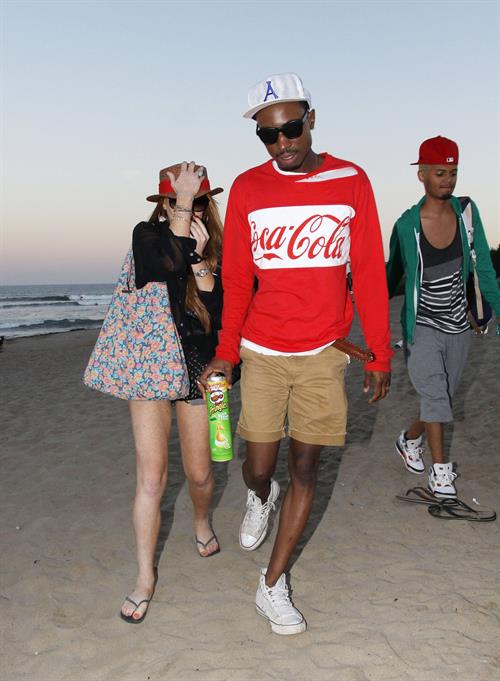 Lindsay Lohan - arriving to the beach in Malibu - August 12, 2012
