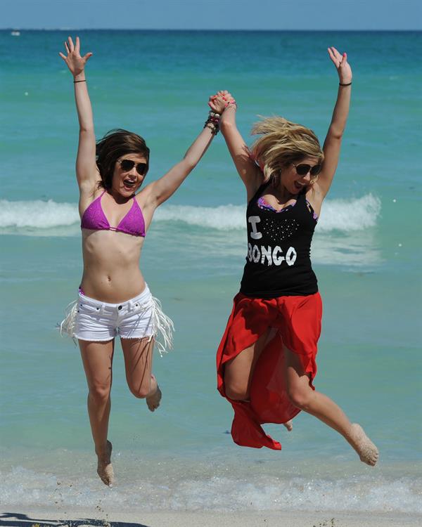 Lucy Hale and Ashley Benson photoshoot at the Bondo Bikini Shack on Miami Beach on March 24, 2012