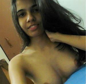 Nini taking a selfie and - breasts