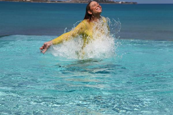 Mariah Carey Looks stunning as she relaxes in the water while on Easter vacation April 2, 2013