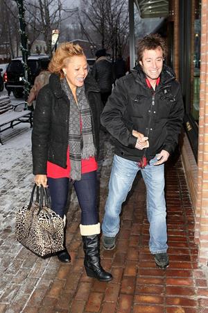 Mariah Carey made another stop at the Louis Vuitton store to shop with a family member. December 24, 2012 
