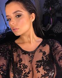Demi Rose Mawby taking a selfie