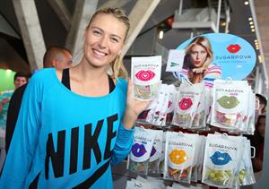 Maria Sharapova Sugarpova stand during day five of the Mutua Madrid Open tennis tournament May 8, 2013 