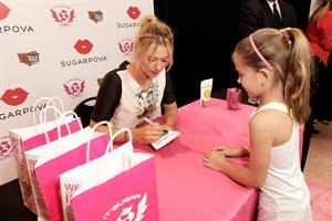 Maria Sharapova poses during Maria Sharapova launches her Sugarpova Candy Collection December 13, 2012 