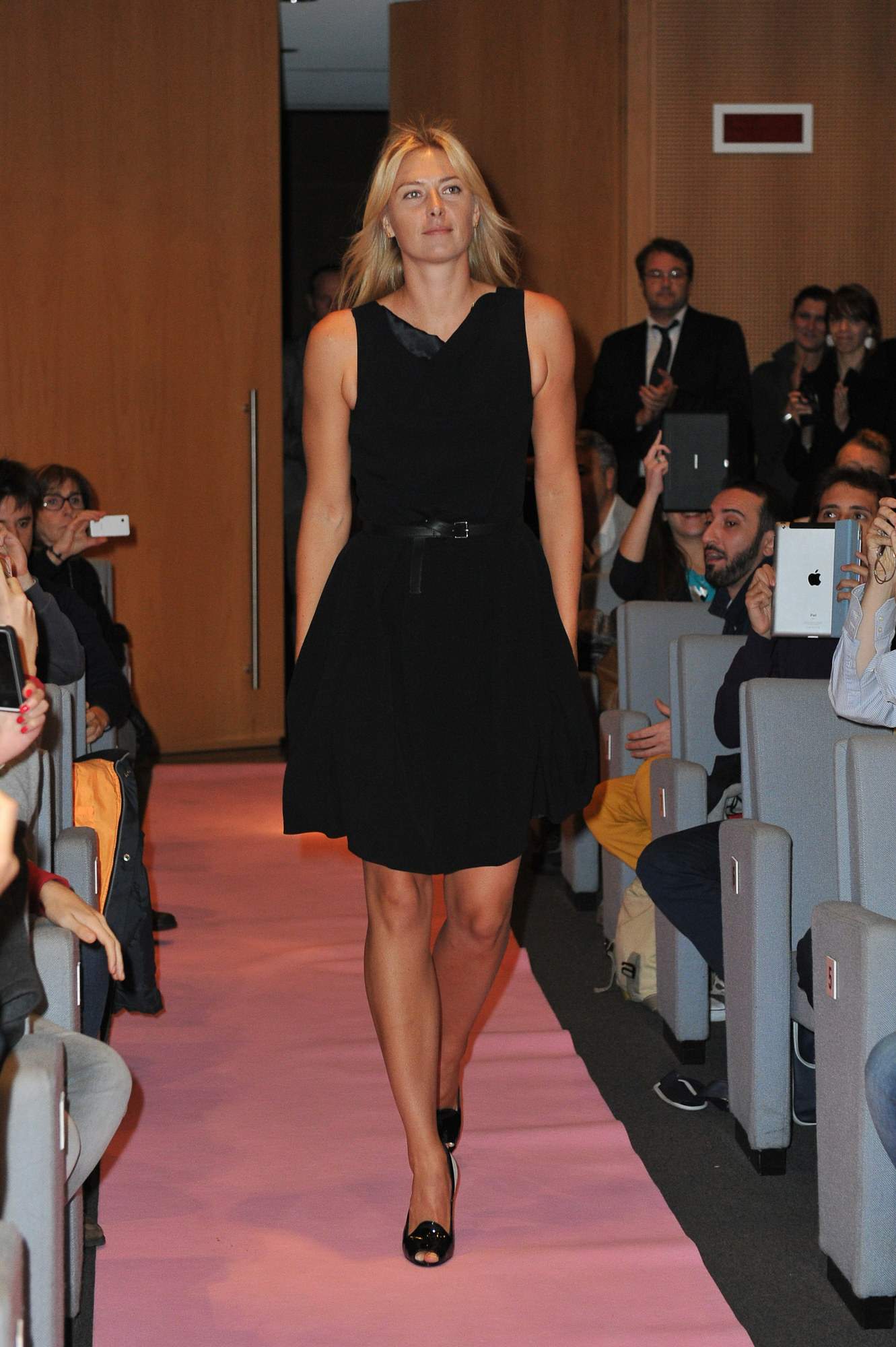 Maria Sharapova attends a press conference to present Saturday's exhibition match Milan November 30, 2012 