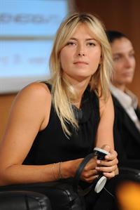 Maria Sharapova attends a press conference to present Saturday's exhibition match Milan November 30, 2012 