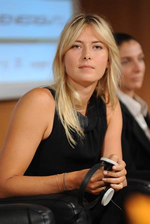 Maria Sharapova attends a press conference to present Saturday's exhibition match Milan November 30, 2012 