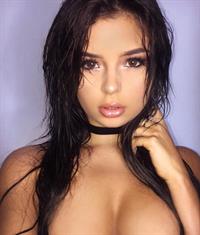 Demi Rose Mawby taking a selfie