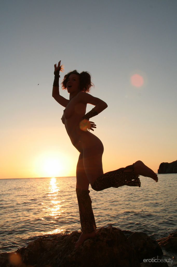 Firebird A in  Having Fun  for Erotic Beauty - Firebird A bares her gorgeous physique as she playfully poses outdoors.