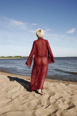 Darcia in  Presenting Darcia  for Erotic Beauty - Darcia playfully poses at the beach baring her petite body.