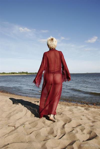 Darcia in  Presenting Darcia  for Erotic Beauty - Darcia playfully poses at the beach baring her petite body.