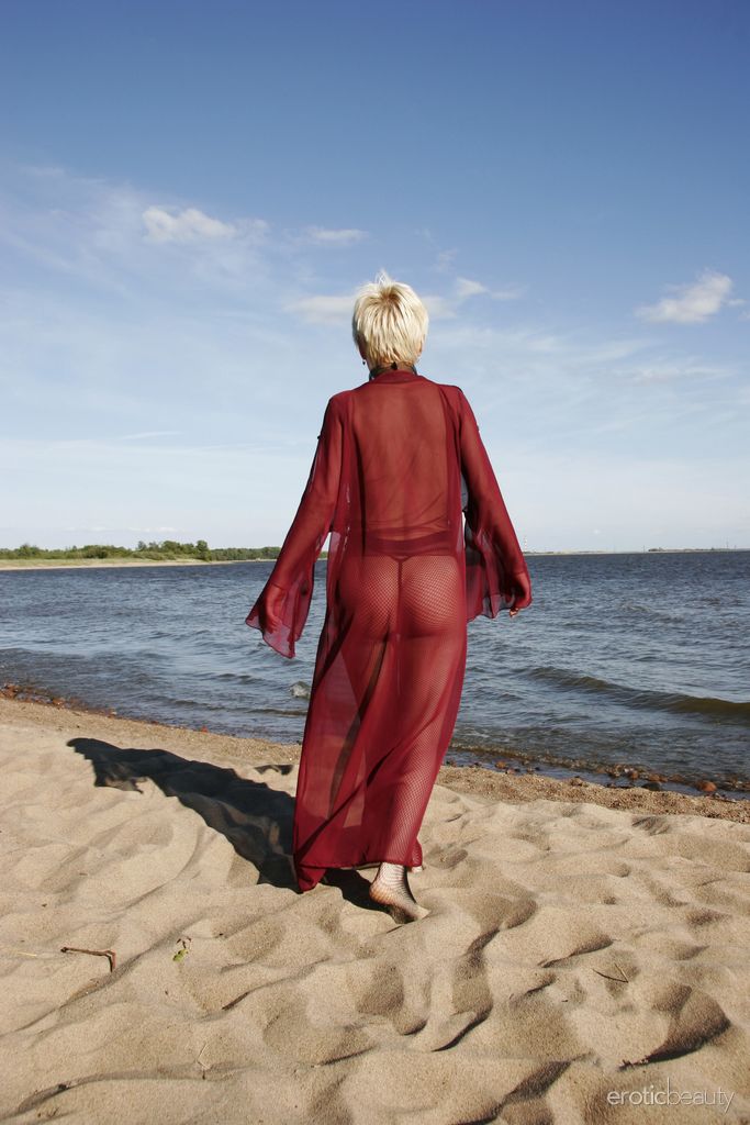 Darcia in  Presenting Darcia  for Erotic Beauty - Darcia playfully poses at the beach baring her petite body.