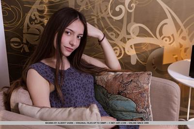 Maxima in  Andea  for MetArt - Maxima sensually strips on the chair baring her sweet pussy.