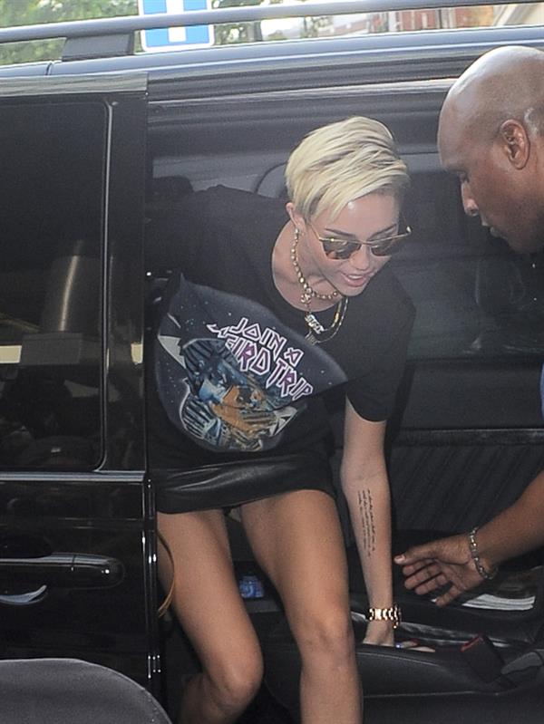 Miley Cyrus Spotted in a Join A Weird Trip T-shirt outside the London Studios in London (18.07.2013) 