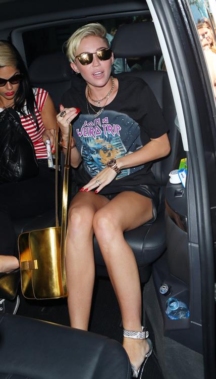 Miley Cyrus Spotted in a Join A Weird Trip T-shirt outside the London Studios in London (18.07.2013) 