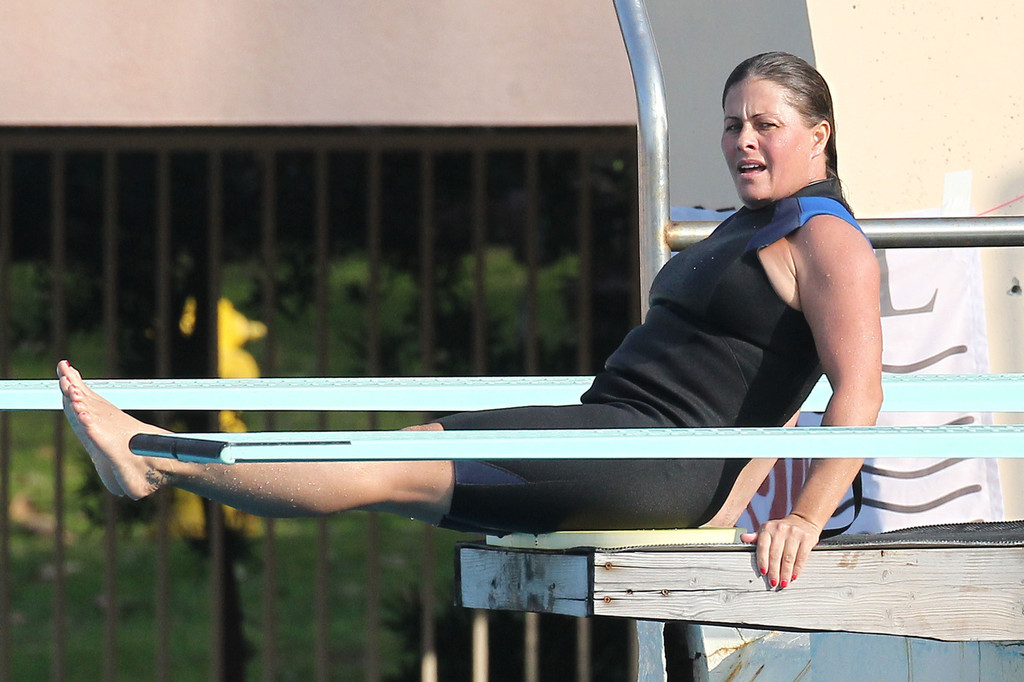 Nicole Eggert prepares for 'Splash' (sports bra/wetsuit) 6.2.2013 