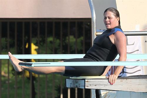 Nicole Eggert prepares for 'Splash' (sports bra/wetsuit) 6.2.2013 