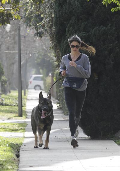 Nikki Reed jogging with her dog Enzo in Los Angeles on February 6, 2013