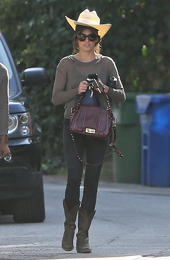 Nikki Reed walking and wearing her cowboy hat in Los Angeles on February 21, 2013