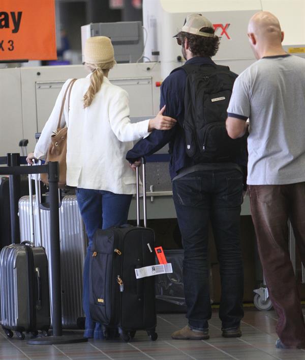 Rachel McAdams - Departs on a flight at LAX airport - August 9, 2012