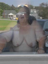 Showing myself in a hotel room in front of an open window