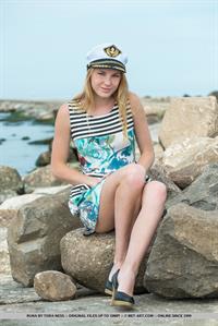 Runa in  Finnec  for MetArt - Runa strips by the shore baring her small tits and pink pussy.