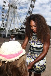 Serena Williams poses for a Photograph at the Wheel of Brisbane in South Bank December 31, 2012 